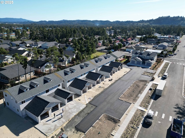 aerial view with a residential view, a forest view, and a mountain view