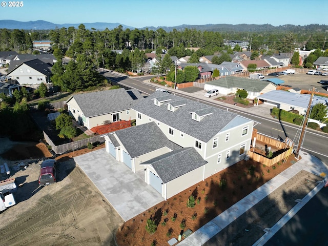 aerial view with a mountain view and a residential view