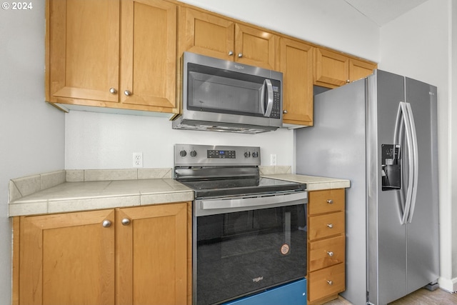 kitchen featuring appliances with stainless steel finishes