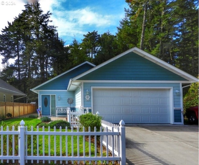 view of front of property featuring a garage