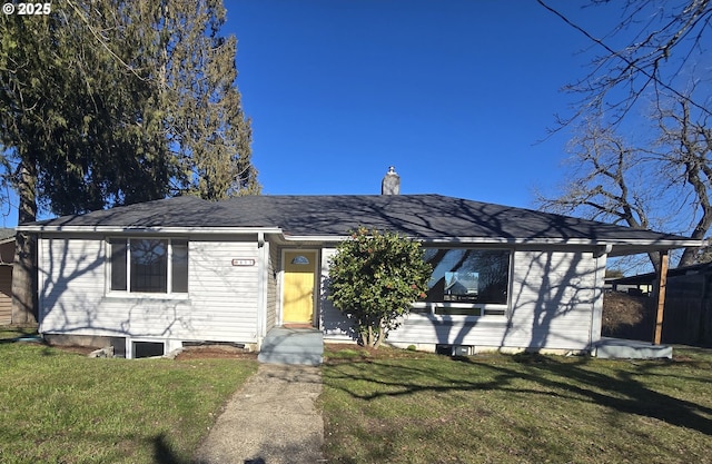 view of front of home featuring a front yard