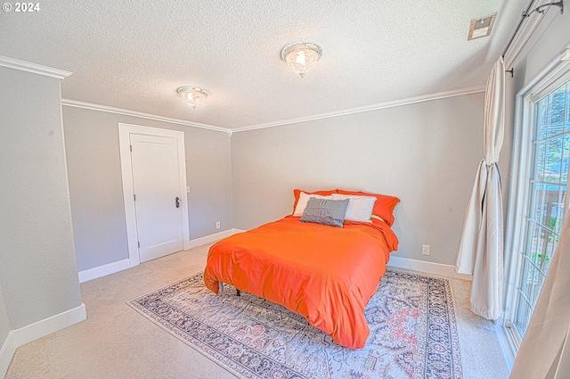 carpeted bedroom featuring a textured ceiling