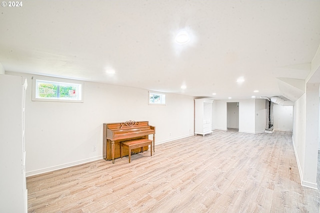 basement featuring light hardwood / wood-style flooring