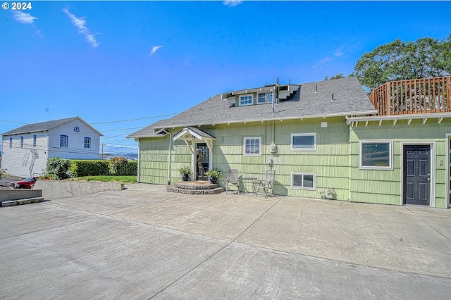 back of property with a patio area