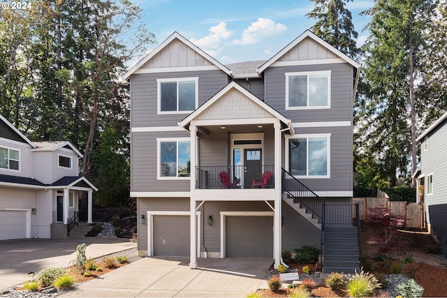 craftsman-style house with a garage and covered porch