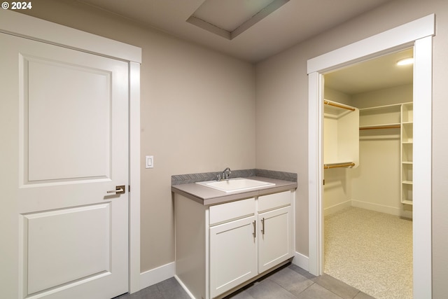 bathroom featuring vanity and tile patterned floors