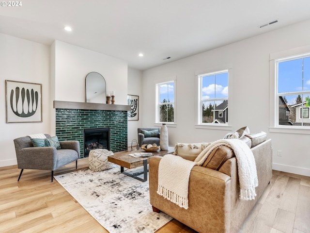 living room with light hardwood / wood-style flooring