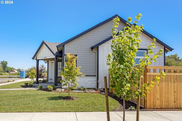 view of front of property with a front lawn