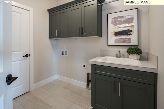 laundry room with cabinets, hookup for a washing machine, light tile patterned floors, electric dryer hookup, and sink