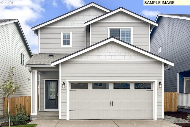 craftsman inspired home featuring a garage