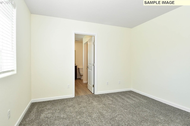 view of carpeted spare room