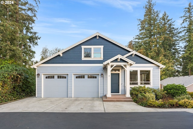 view of front of property featuring a garage