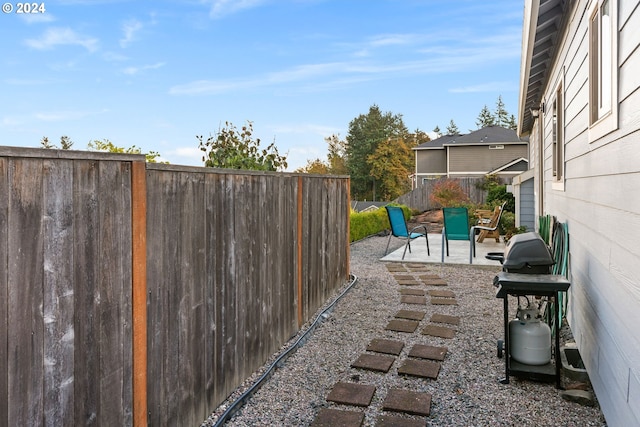 view of patio with a grill