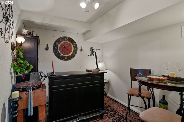 interior space with a dry bar and baseboards