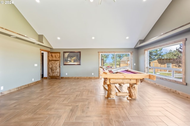 game room featuring light parquet floors, high vaulted ceiling, and pool table