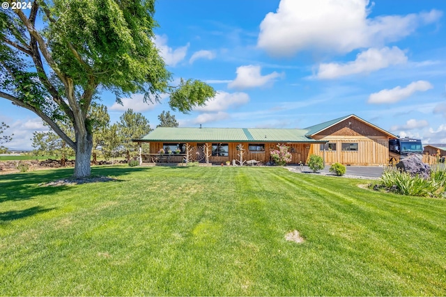 exterior space featuring a front lawn