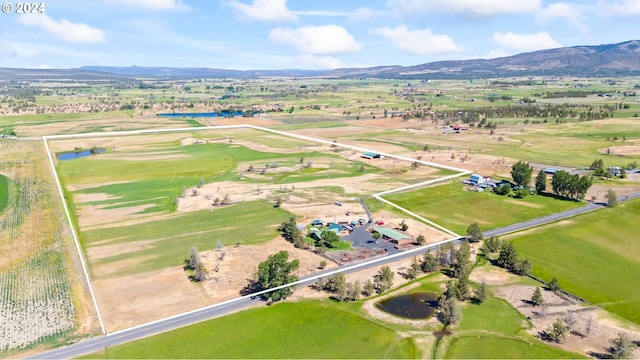 drone / aerial view featuring a mountain view