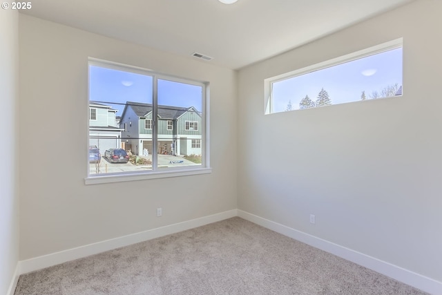 view of carpeted spare room