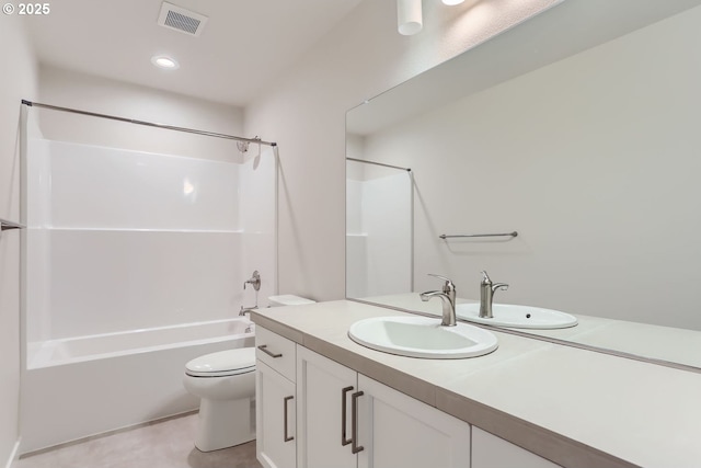 full bathroom featuring toilet, vanity, and shower / bathtub combination