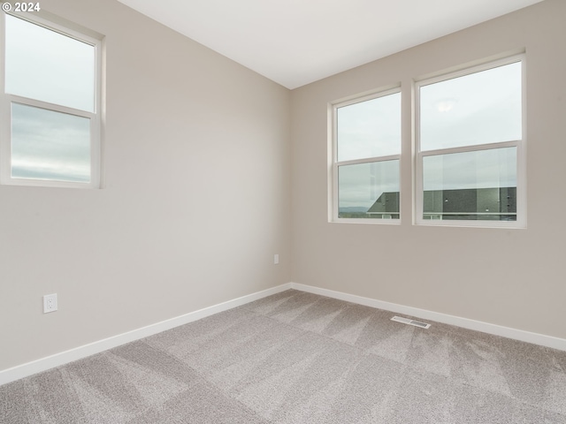 empty room featuring carpet