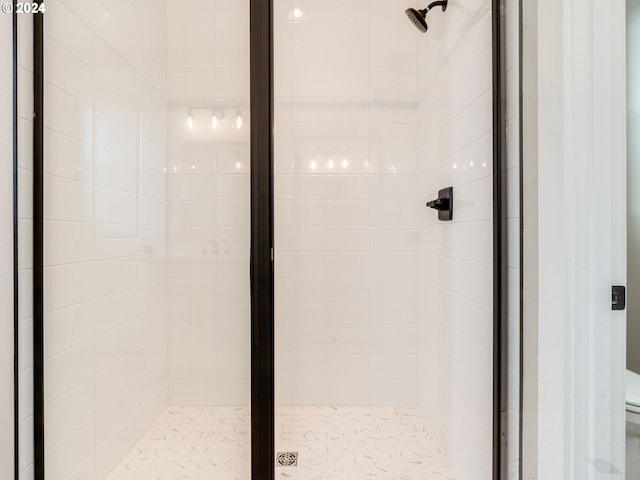 bathroom featuring an enclosed shower