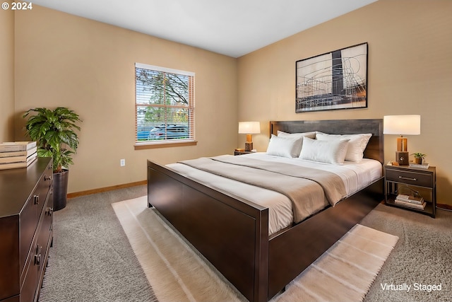 bedroom featuring light carpet