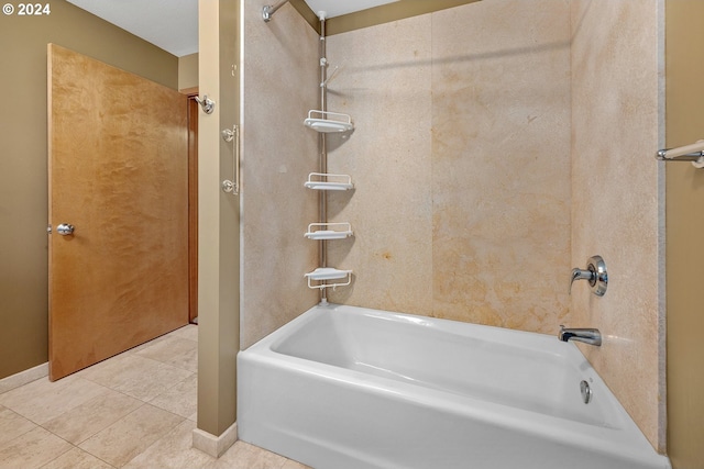 bathroom featuring tile patterned flooring and bathtub / shower combination