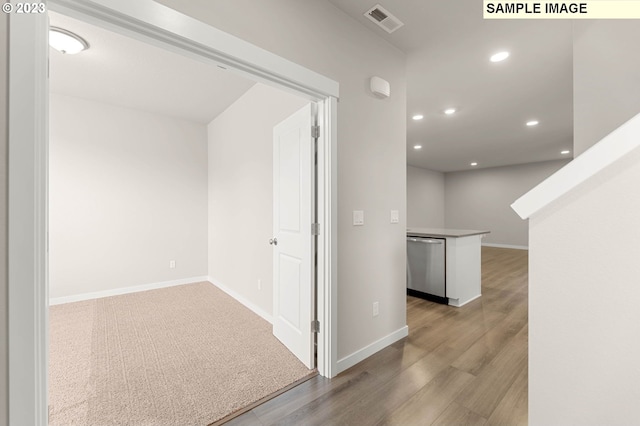 corridor featuring light hardwood / wood-style flooring