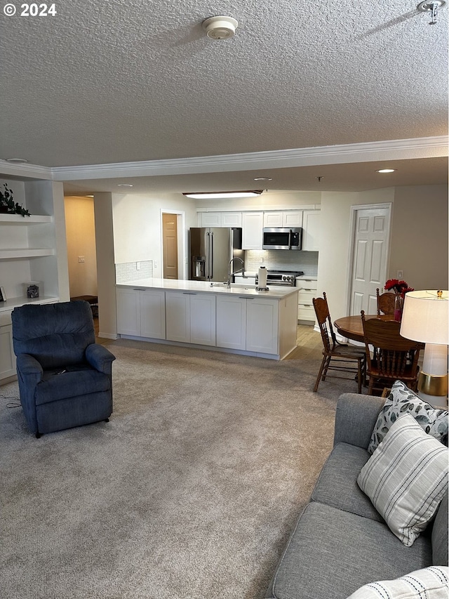 carpeted living room featuring a textured ceiling