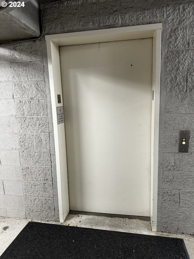 doorway to property with elevator