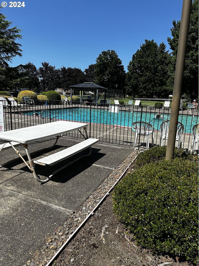 view of pool featuring a gazebo