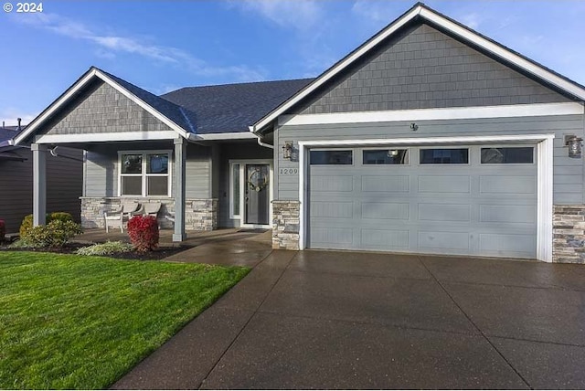 craftsman inspired home with a garage