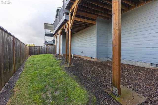 view of home's exterior featuring a yard