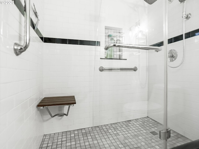 bathroom featuring a shower stall