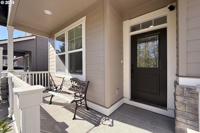 doorway to property featuring a porch