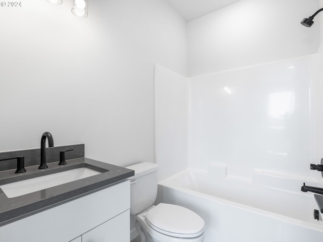 full bathroom featuring vanity, toilet, and shower / tub combination