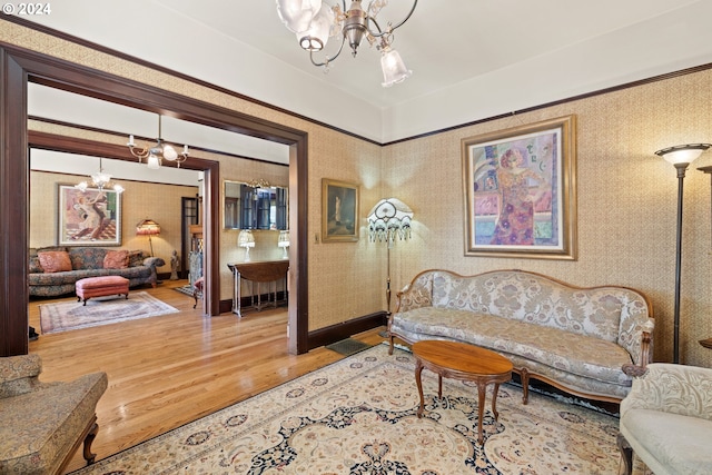 living room featuring hardwood / wood-style floors and an inviting chandelier