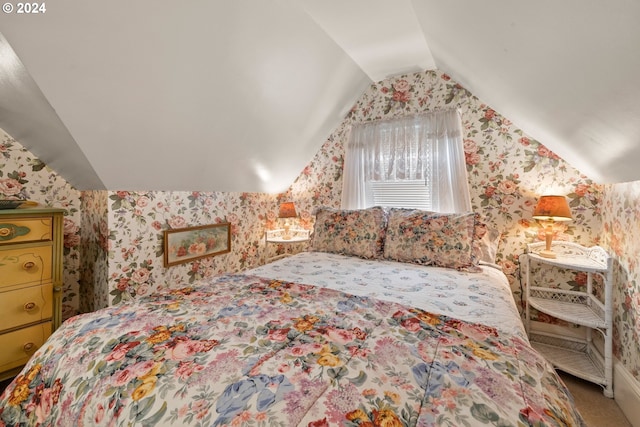 bedroom with vaulted ceiling