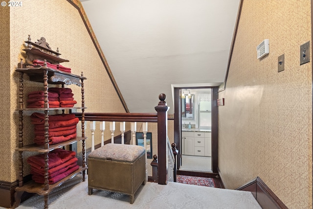 interior space featuring vaulted ceiling