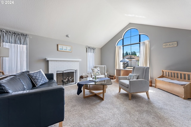 carpeted living room featuring a brick fireplace and vaulted ceiling