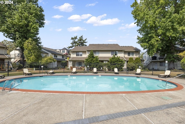 view of pool featuring a patio area