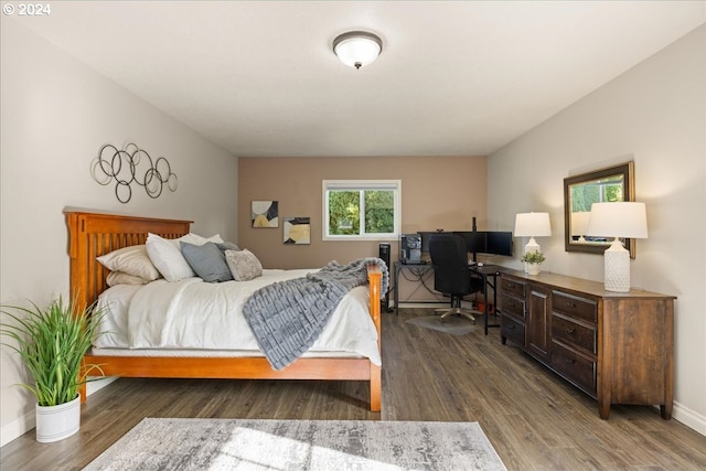 bedroom featuring dark hardwood / wood-style floors