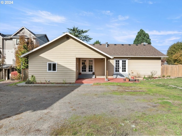 back of house with a patio and french doors