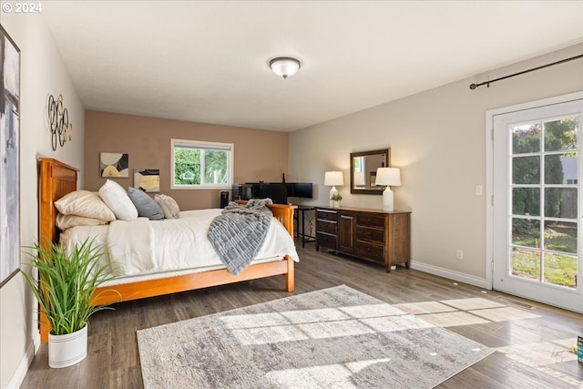 bedroom featuring hardwood / wood-style flooring