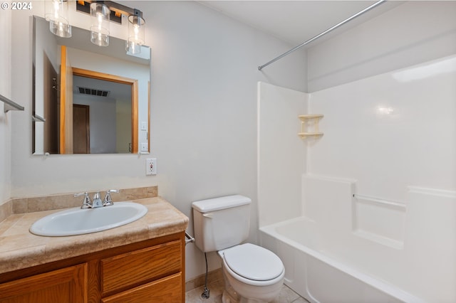 full bathroom with tile patterned flooring, vanity, toilet, and shower / tub combination