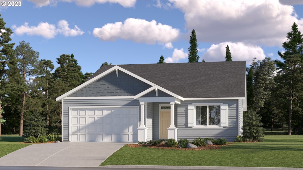 view of front facade featuring a garage and a front lawn