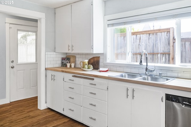 4524 NE 41st Ave, Portland, OR 97211 - kitchen featuring dishwasher, a sink, decorative backsplash, and white cabinetry