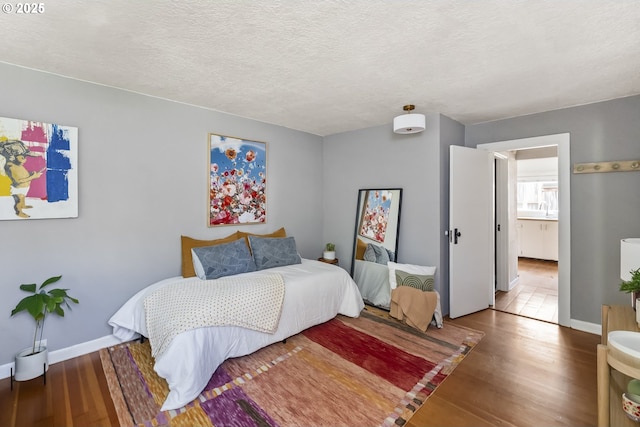 4524 NE 41st Ave, Portland, OR 97211 - bedroom with wood finished floors and a textured ceiling