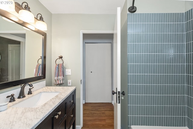 4524 NE 41st Ave, Portland, OR 97211 - full bath with vanity, wood finished floors, and a tile shower