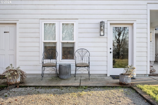 view of exterior entry with central AC